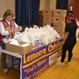 Volunteers with Lemoore Christian Aid were on hand Friday for "Reason for the Season."